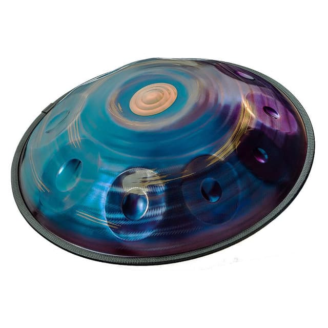 Handpan bleu posé sur une table en bois clair