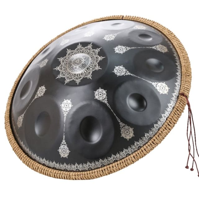 Handpan céleste 9 notes présenté à plat sur fond de lin