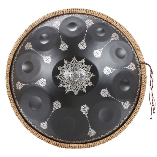 Handpan céleste bleu près d'une fenêtre, lumière du jour