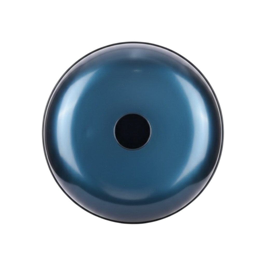 Mains jouant le handpan Évasion Astrale