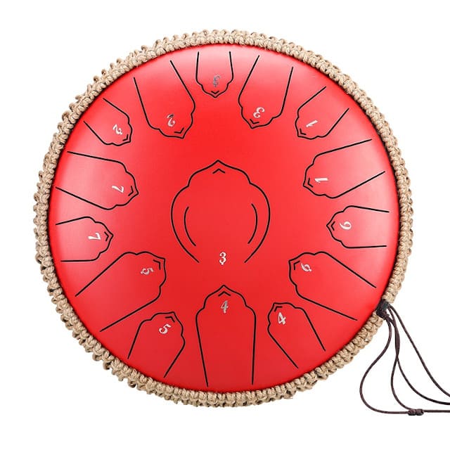 Baguettes en bois posées sur un tongue drum de 35 cm