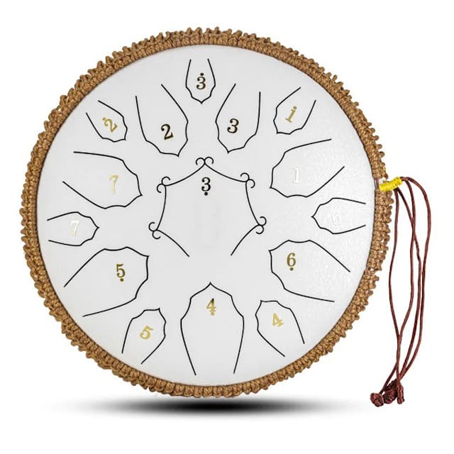Mains effleurant les langues d'un steel tongue drum de 30 cm