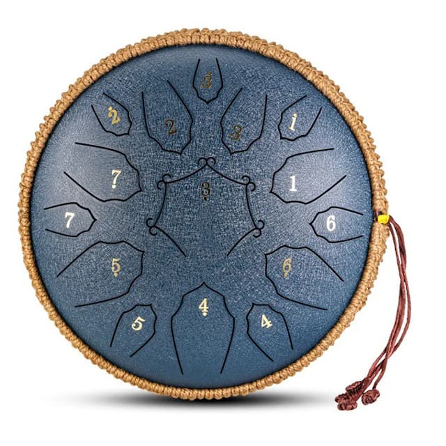 Steel tongue drum 30 cm en coloris sombre sur fond de lin